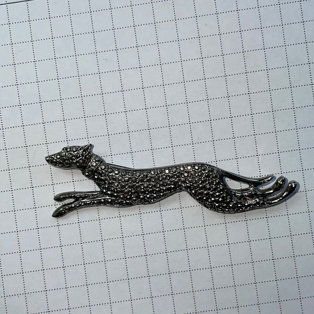Greyhound brooch - silvertone along with metal tie clip.